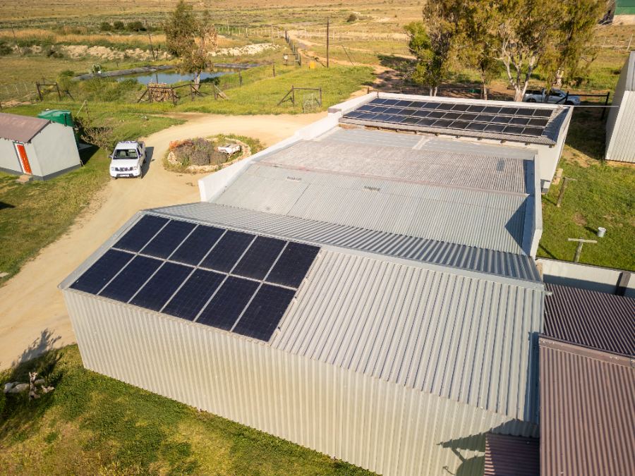 Implement sheds with roof-mounted solar panels