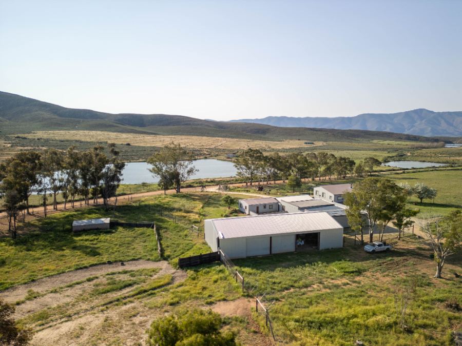 Sewefontein homestead, sheds and dams looking across the valley